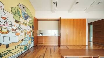 A modern kitchen with wooden cabinets and a built-in sink.