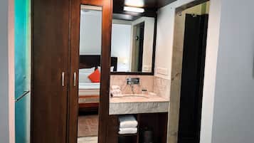 Shower, rainfall showerhead, designer toiletries, hair dryer