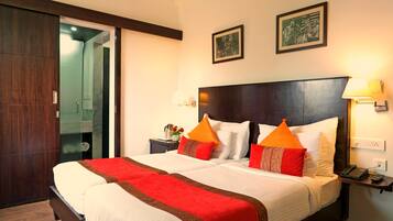 Habitación Deluxe | Ropa de cama de alta calidad y decoración personalizada