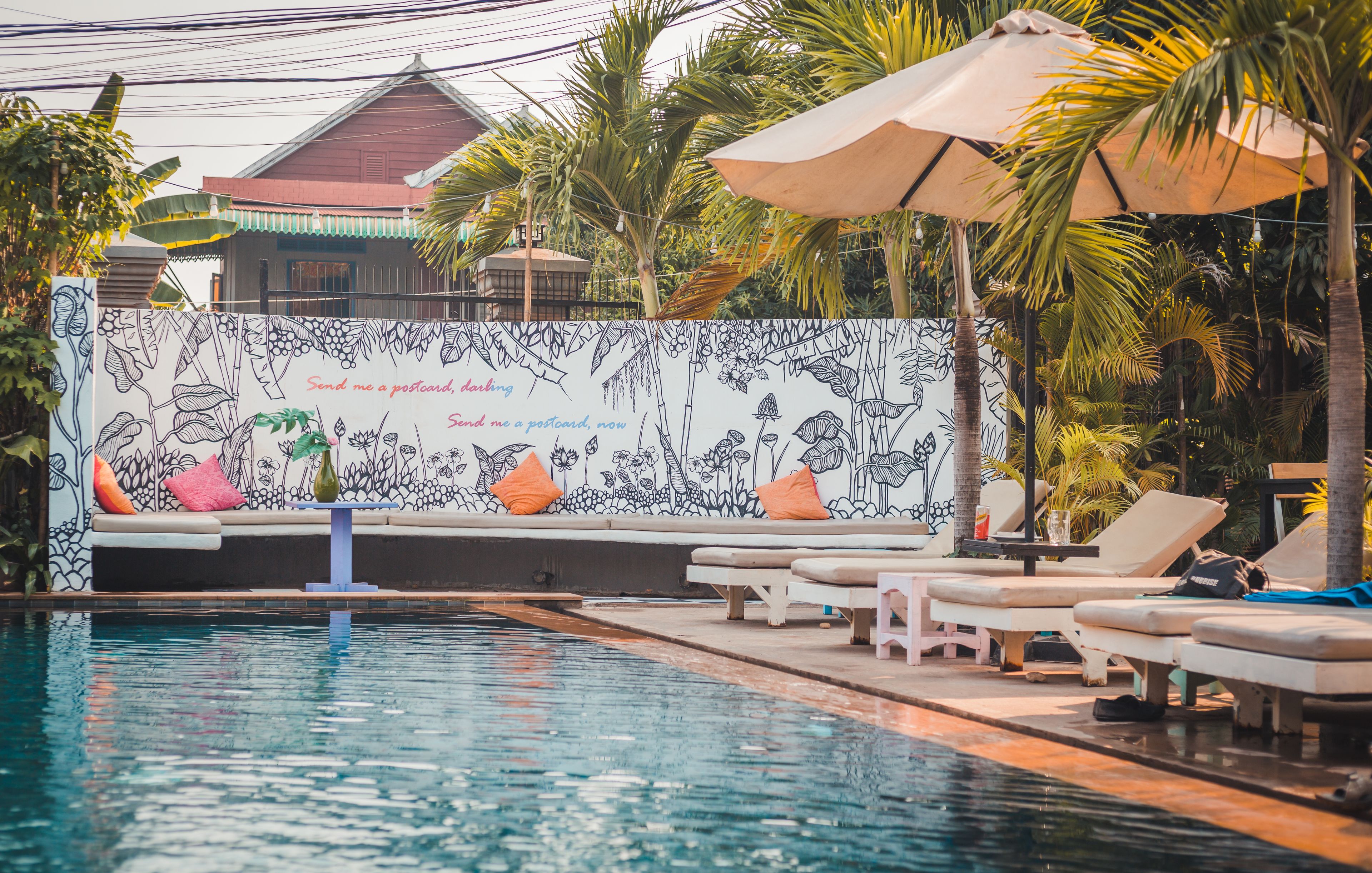 outdoor pool, pool umbrellas, pool loungers