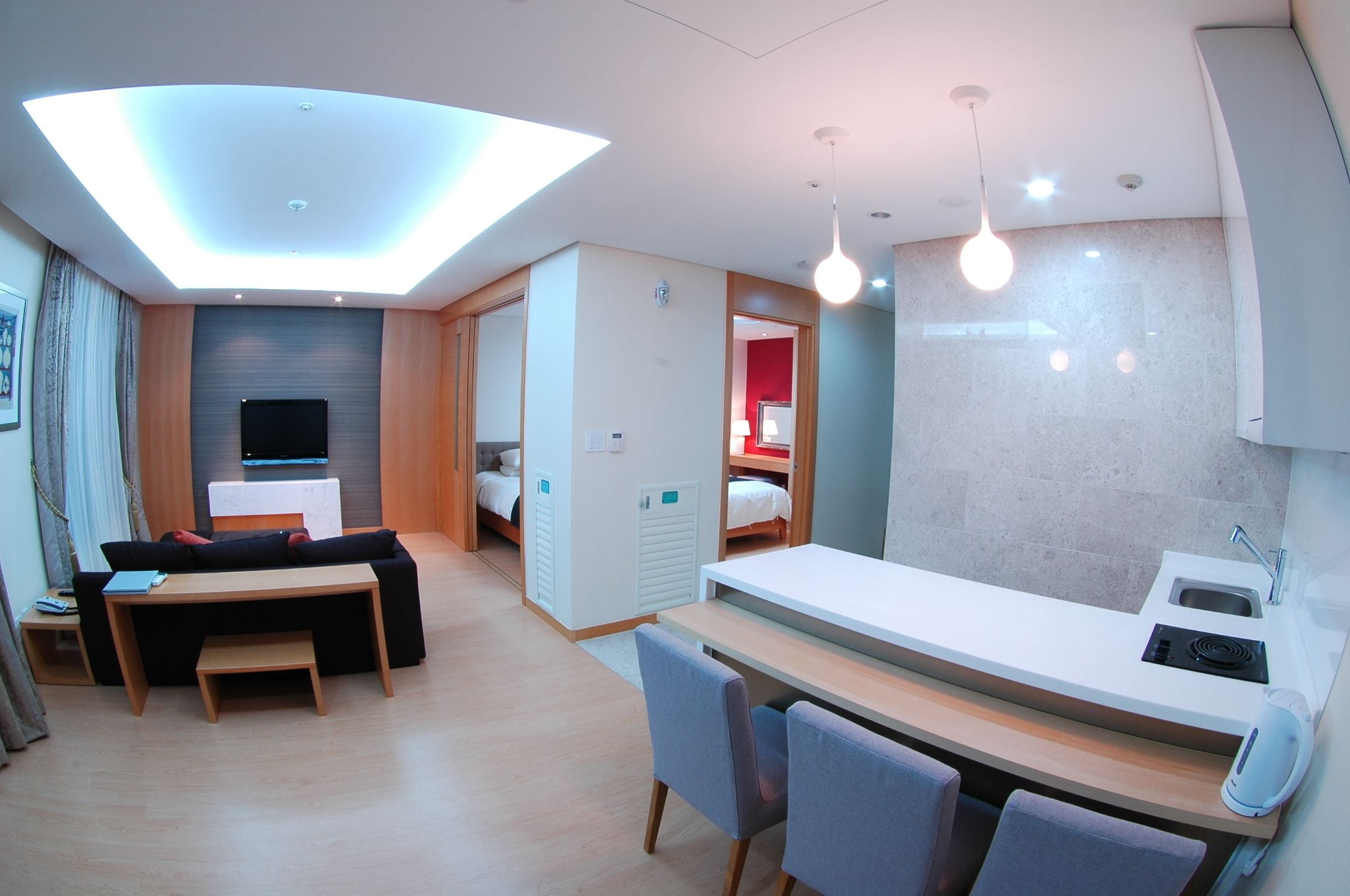 deluxe suite, 1 bedroom, kitchen, mountain view | 1 bedroom, desk, free wifi, bed sheets