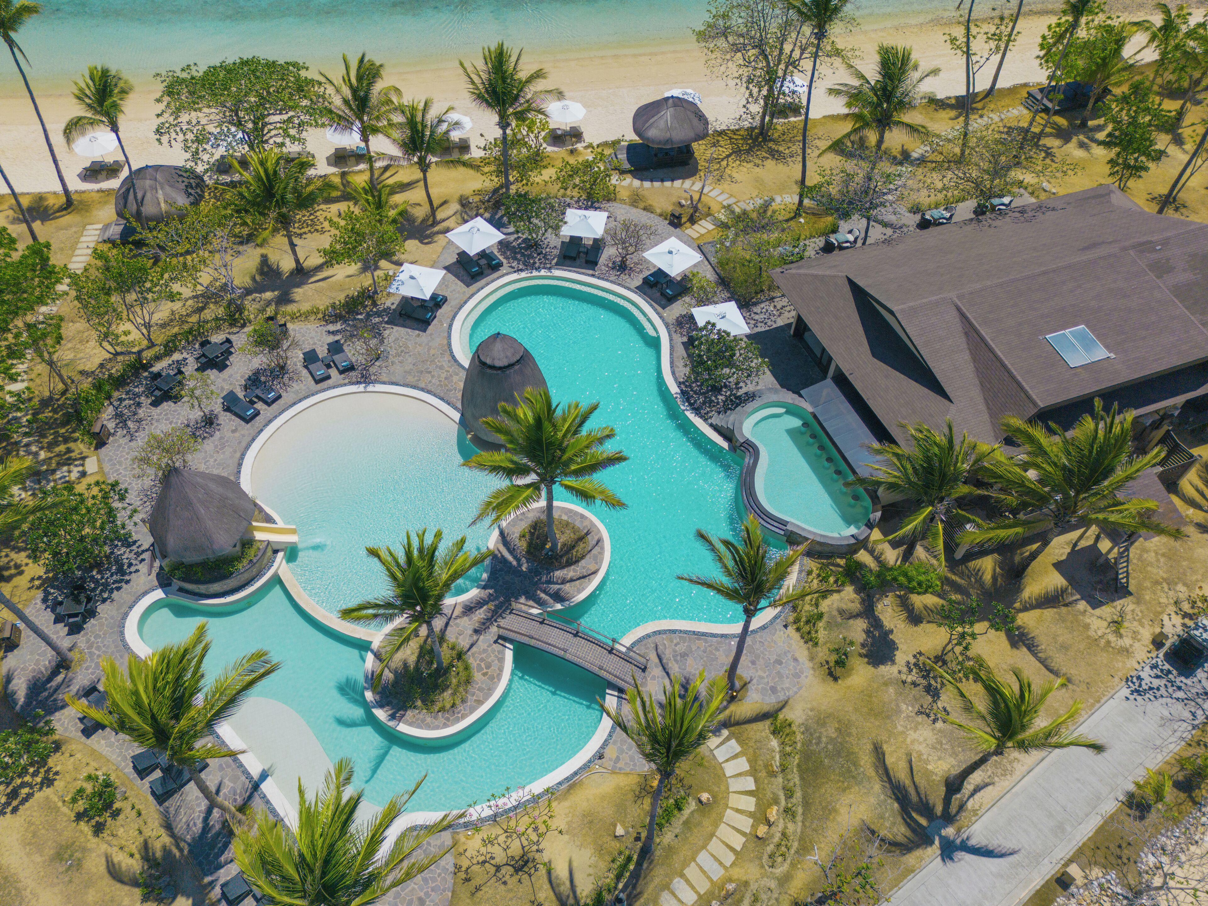 outdoor pool, pool umbrellas, pool loungers