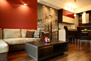 Appartamento Deluxe, 1 letto matrimoniale con divano letto | Area soggiorno | TV LCD