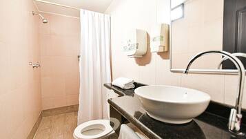 Standard Triple Room, 1 Bedroom | Bathroom | Shower, rainfall showerhead, free toiletries, hair dryer