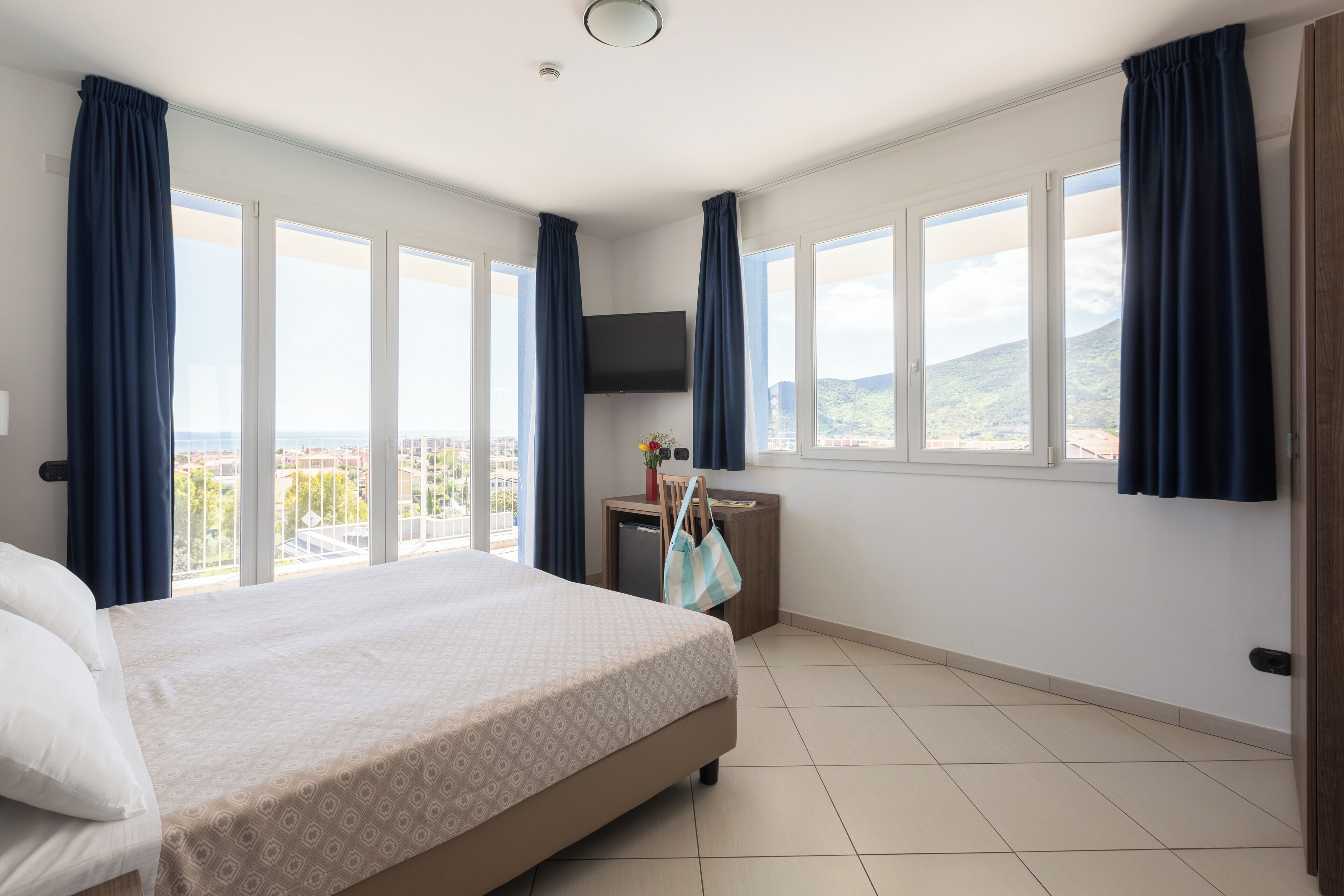 deluxe double room | in-room safe, desk, blackout curtains, free wifi