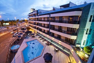 Outdoor pool, pool umbrellas, sun loungers