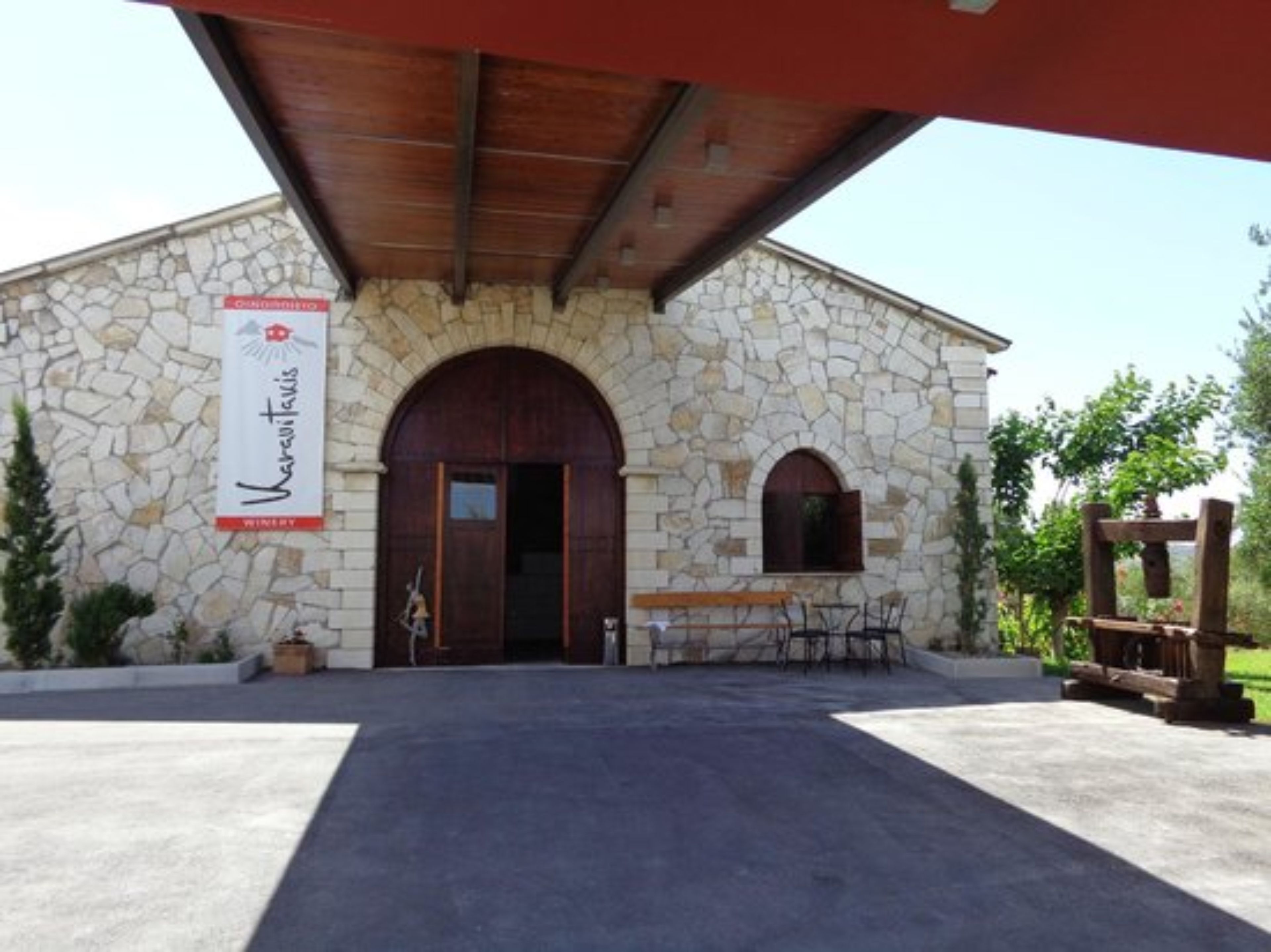 A stone building with a sign reading "Varaquintas Winery."