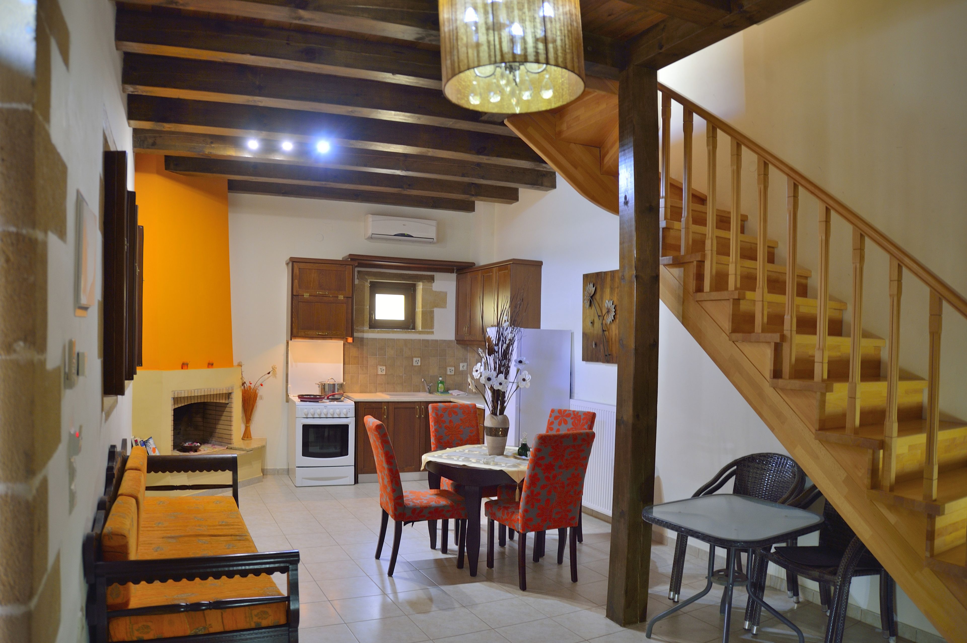 full-sized fridge, stovetop, electric kettle, cookware/dishes/utensils