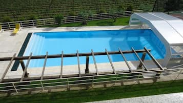 Indoor pool, outdoor pool, pool umbrellas, sun loungers