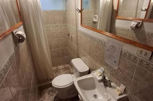 Basic Double Room, 2 Twin Beds | Bathroom | Shower, towels, soap, shampoo