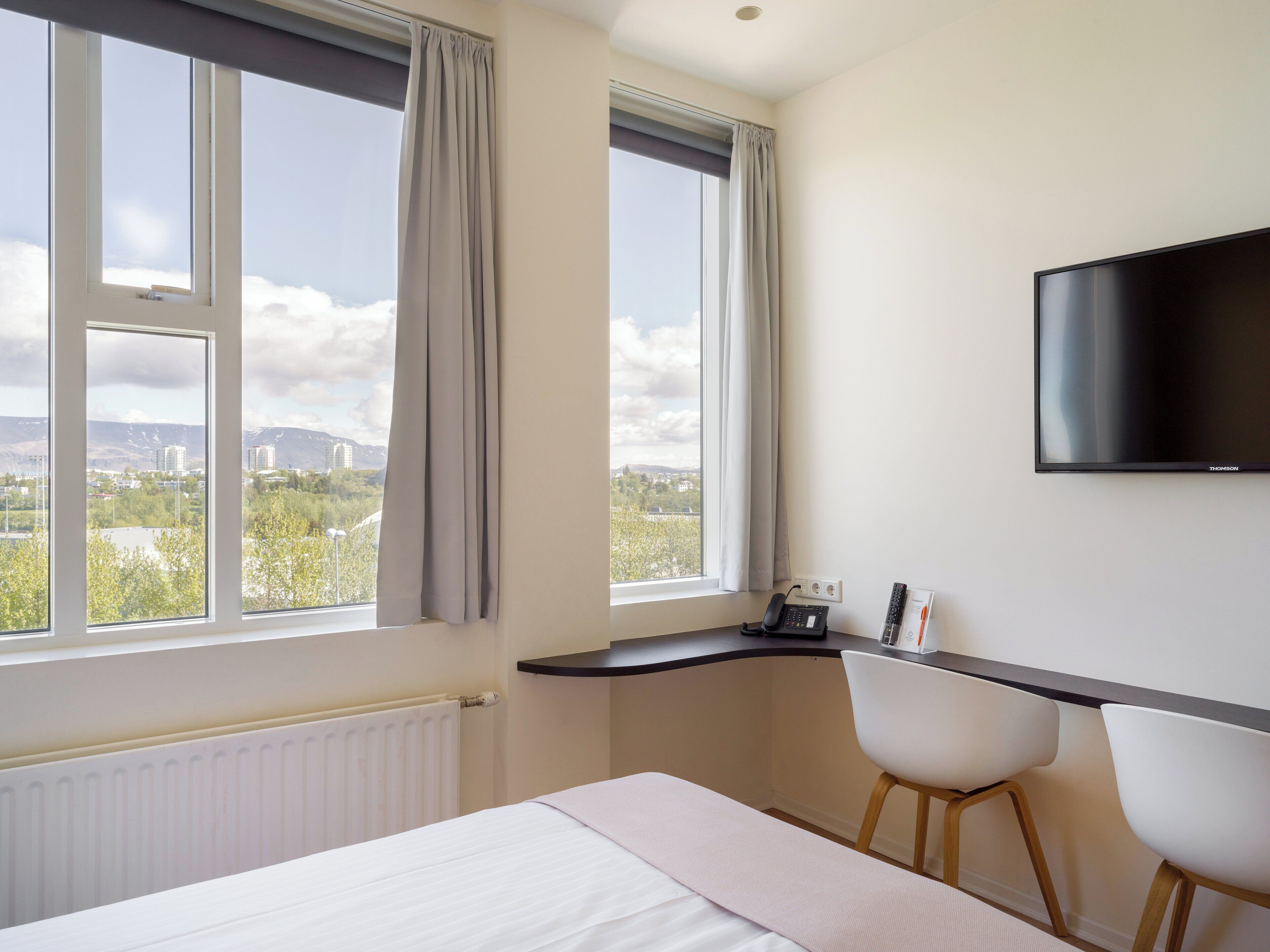 Hypo-allergenic bedding available, in-room safe, desk, laptop workspace