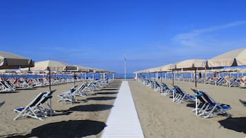 Private beach nearby, white sand, sun loungers, beach umbrellas