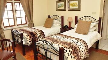 In-room safe, individually decorated, desk, blackout curtains