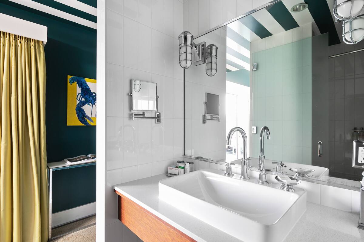 lobster suite | bathroom | shower, rainfall showerhead, free toiletries, hair dryer