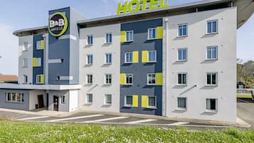 A B&B hotel with a modern design, featuring a prominent 'HOTEL' sign and a logo.