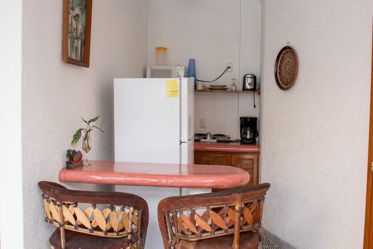 suite, kitchenette | private kitchen | full-sized fridge, coffee/tea maker