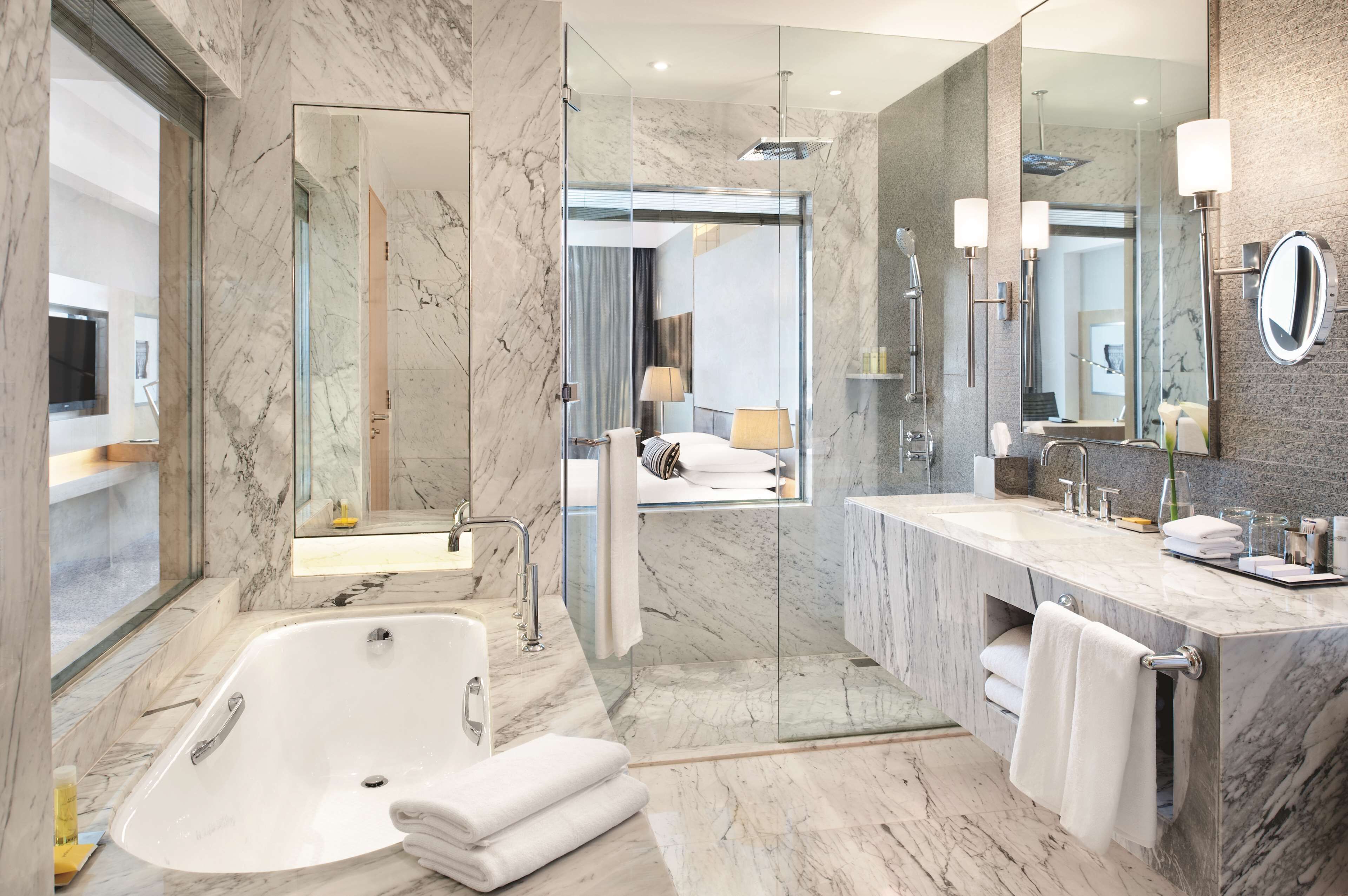 separate bathtub and shower, deep-soaking bathtub, rainfall showerhead