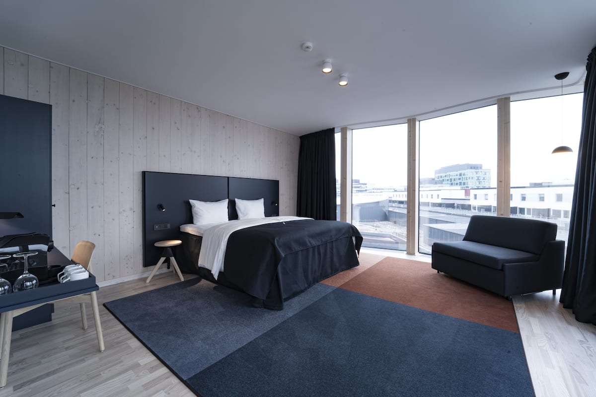 iron/ironing board, bed sheets, alarm clocks