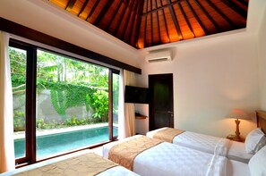 Deluxe Room, 1 Bedroom | Minibar, in-room safe, desk, iron/ironing board - New Pondok Sara Villas (Seminyak)