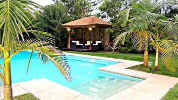 Seasonal outdoor pool, pool umbrellas, sun loungers