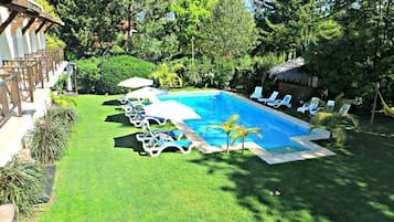 Seasonal outdoor pool, pool umbrellas, sun loungers