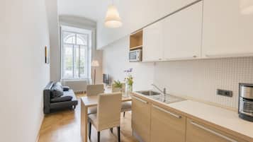 Standard Apartment, 1 Bedroom, Kitchen | Living area | 32-inch flat-screen TV with satellite channels, TV, DVD player
