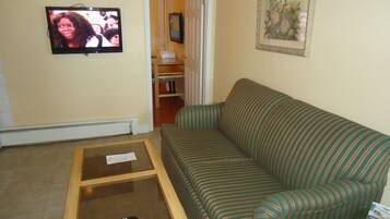 One Bedroom Suite, Lake View | Living area | 32-inch LCD TV with cable channels, TV