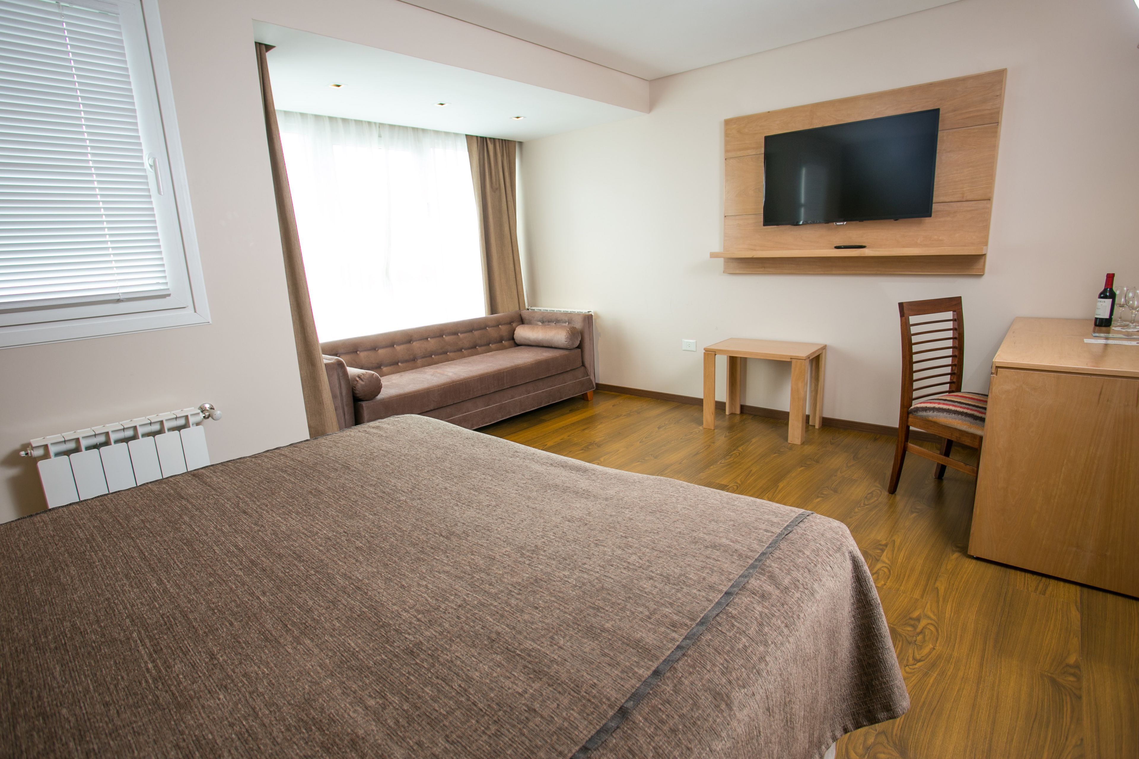 classic room, city view | minibar, in-room safe, desk, blackout curtains