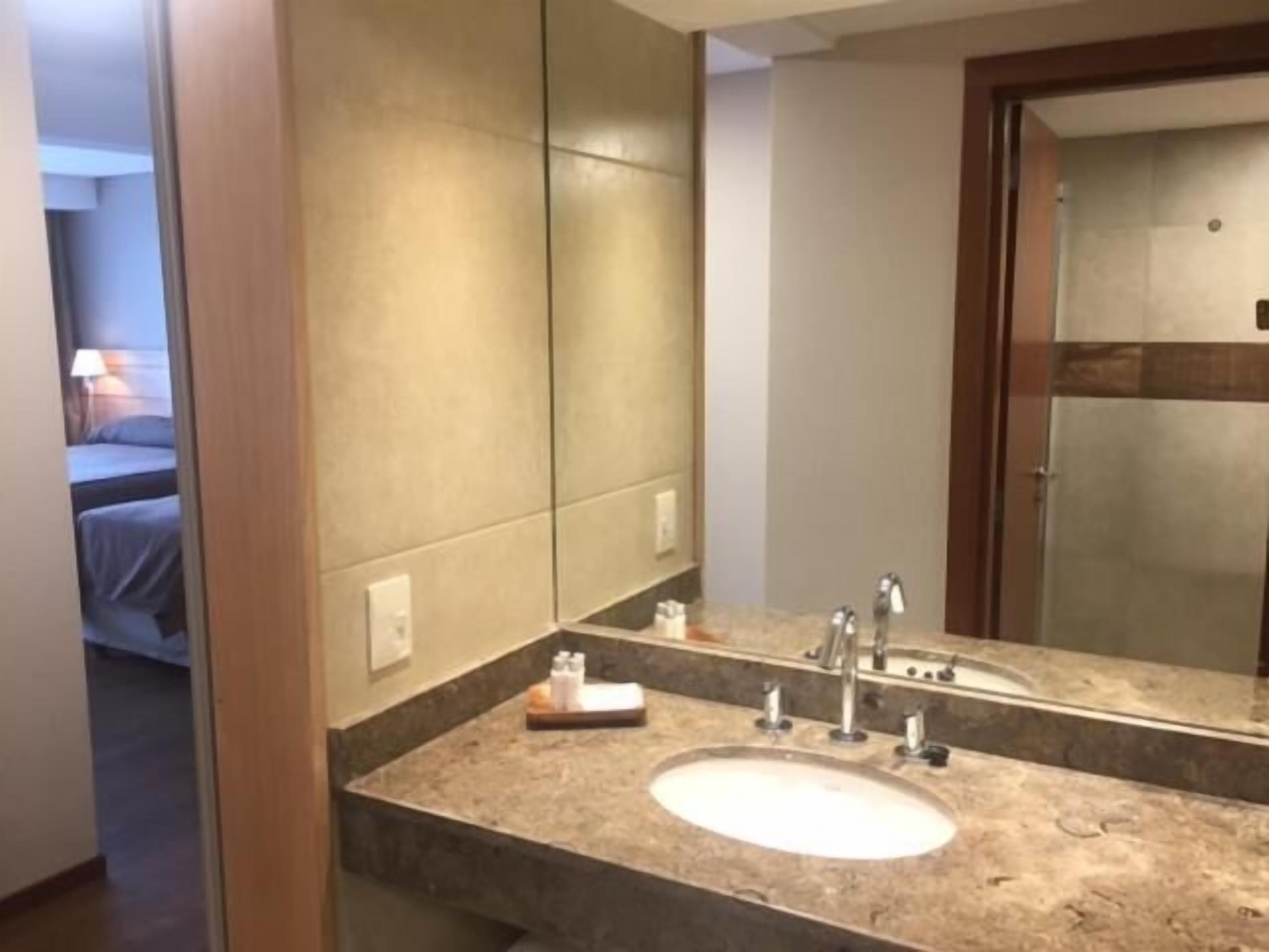 combined shower/bathtub, deep-soaking bathtub, hair dryer, bidet