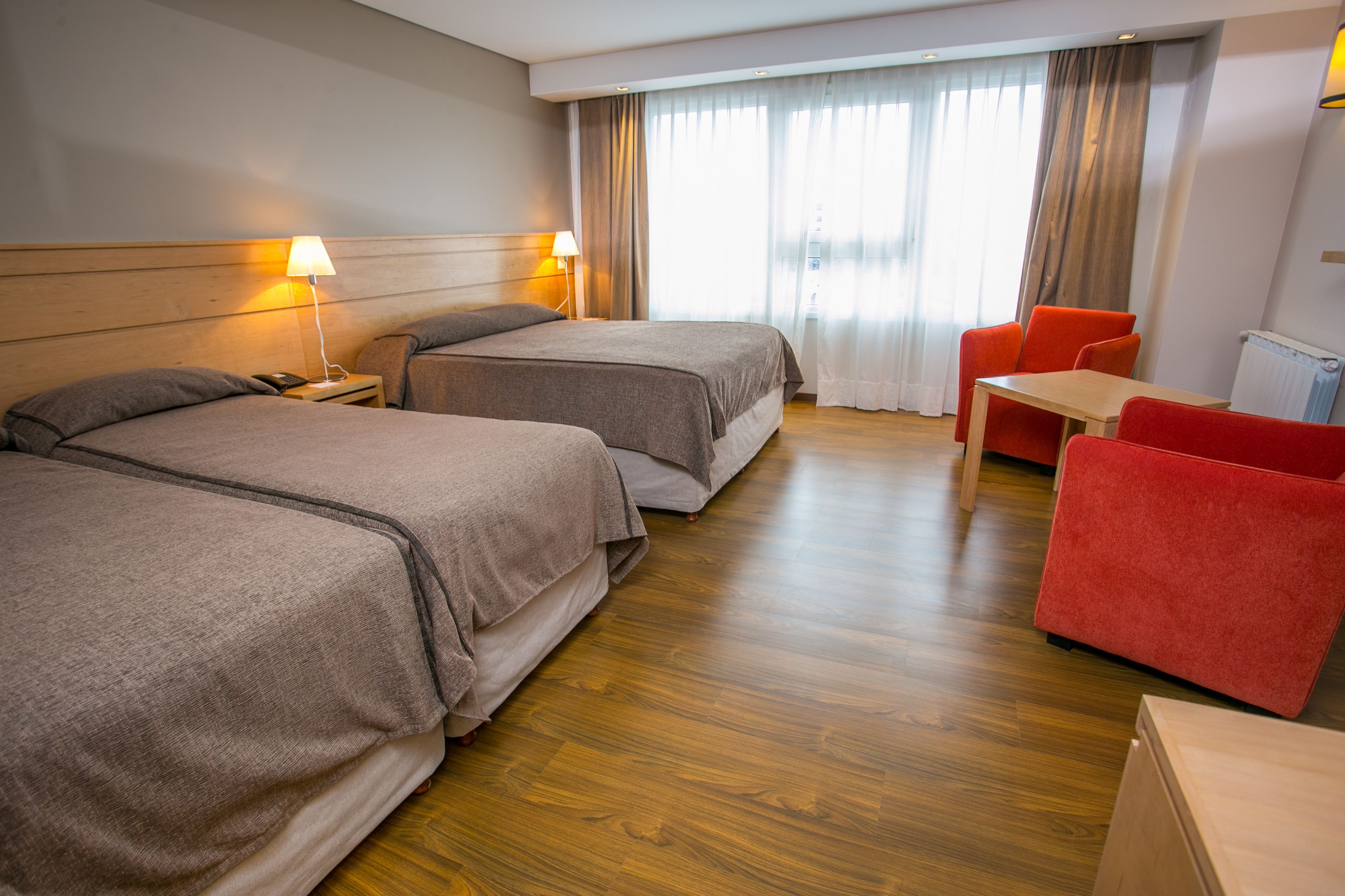 premium room, lake view | minibar, in-room safe, desk, blackout curtains