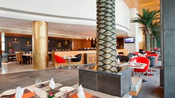 Breakfast, lunch, dinner served; international cuisine