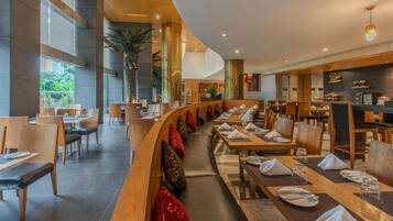 Breakfast, lunch, dinner served; international cuisine