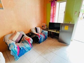 Standard Single Room | Living area | LCD TV - Acacia Sunset Village Inn (Panglao)