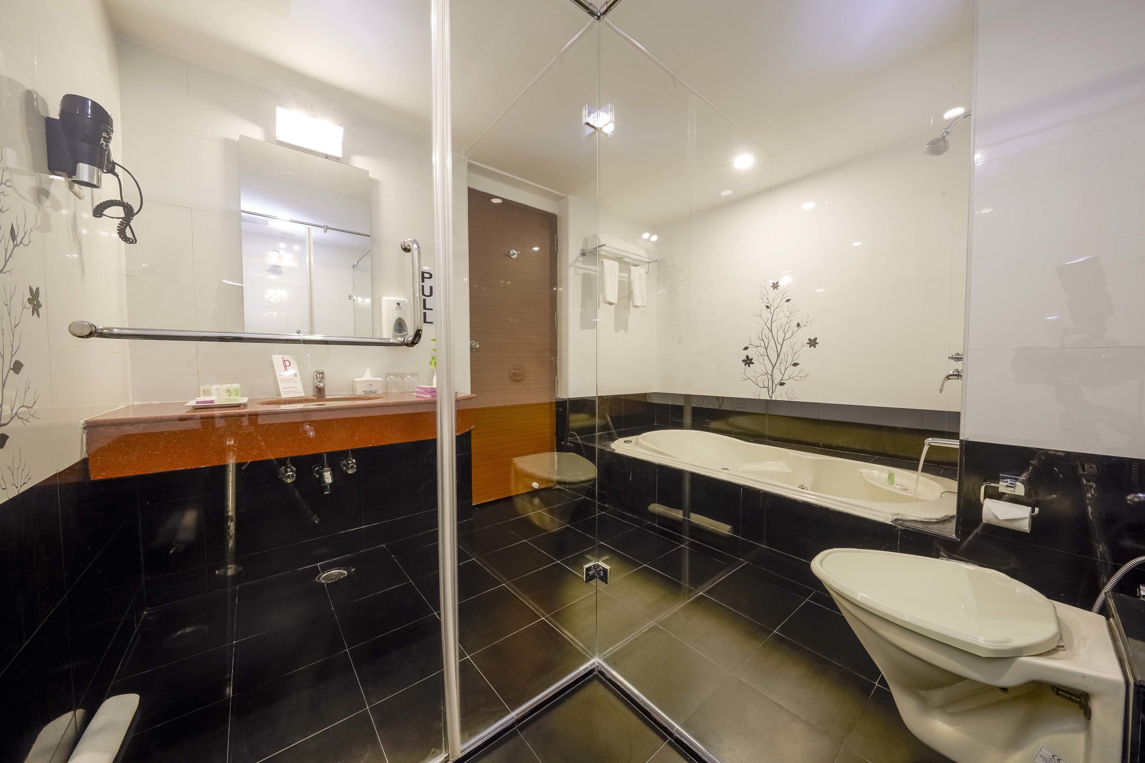 JP Suite  | Bathroom | Rainfall showerhead, free toiletries, hair dryer, bathrobes