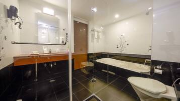 Suite, 1 Tempat Tidur Double | Kamar mandi | Pancuran hujan, perlengkapan mandi gratis, dan pengering rambut