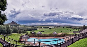 Outdoor pool, pool umbrellas, sun loungers