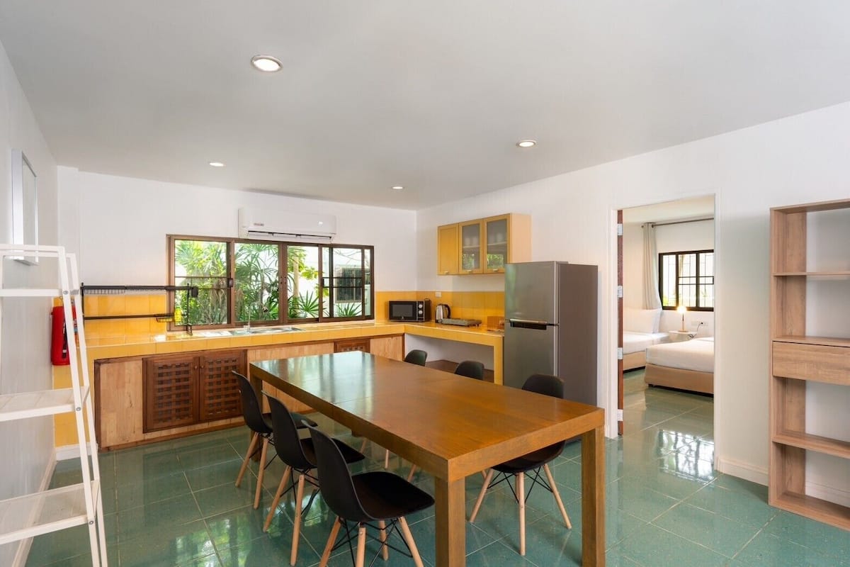 three bedroom family suite with private pool | living area | lcd tv, table football, ping pong, toys
