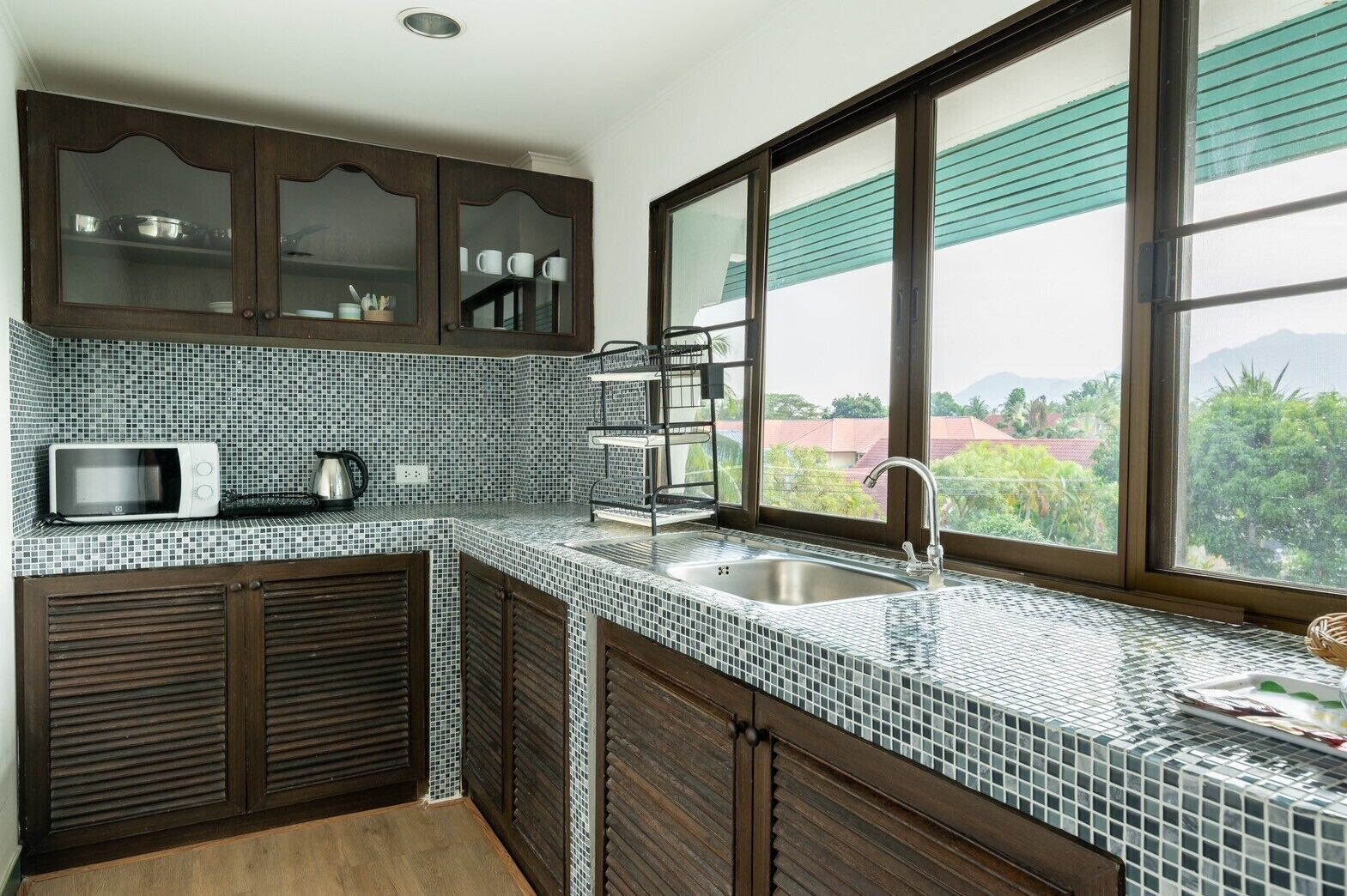 two bedroom deluxe suite with garden view | private kitchen | fridge, electric kettle