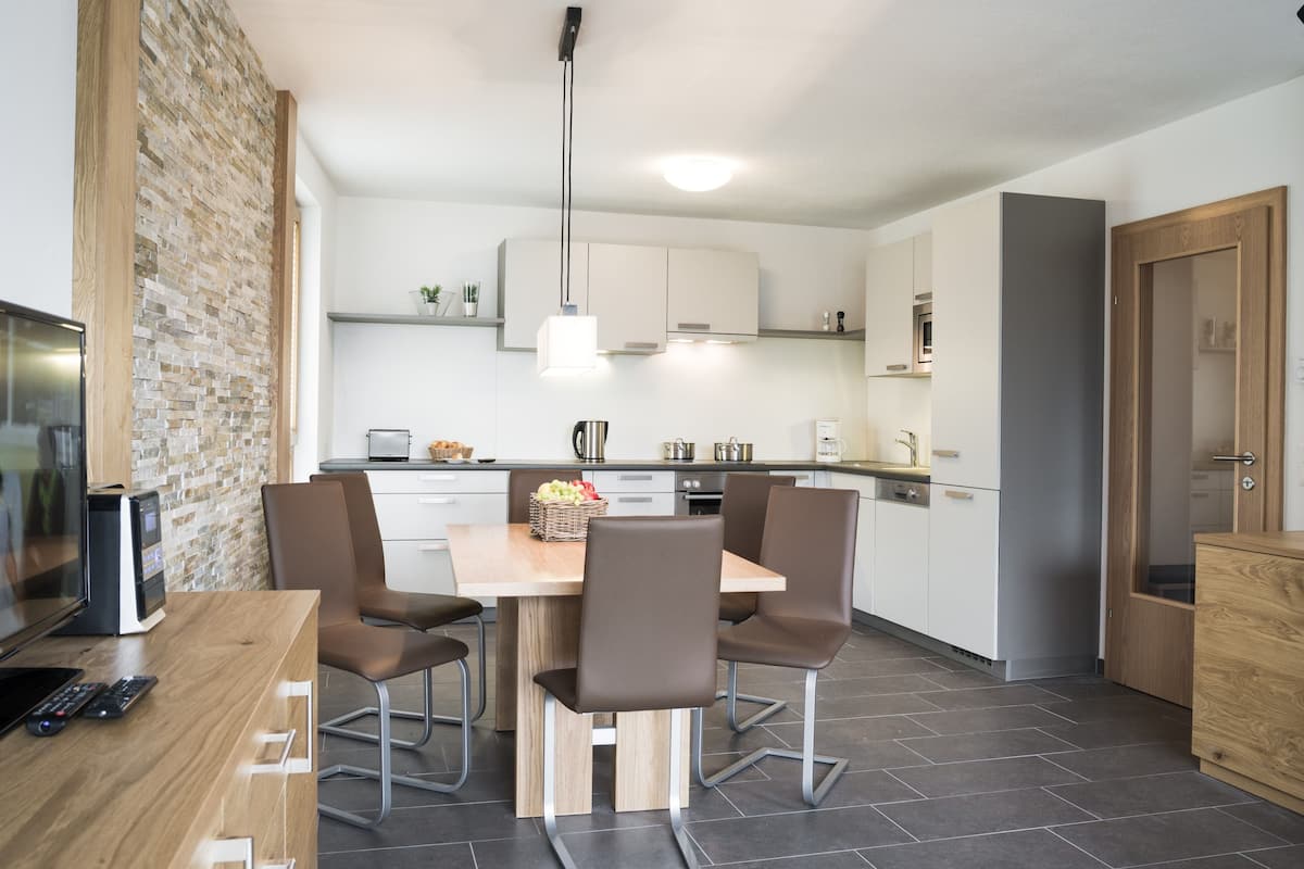 Comfort Apartment | Living area | TV