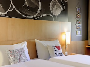 Desk, soundproofing, free cots/infant beds, free WiFi