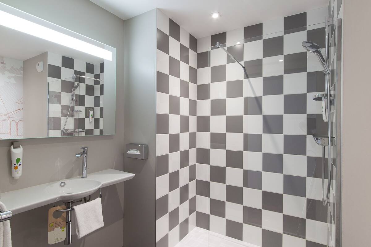 shower, eco-friendly toiletries, hair dryer, towels