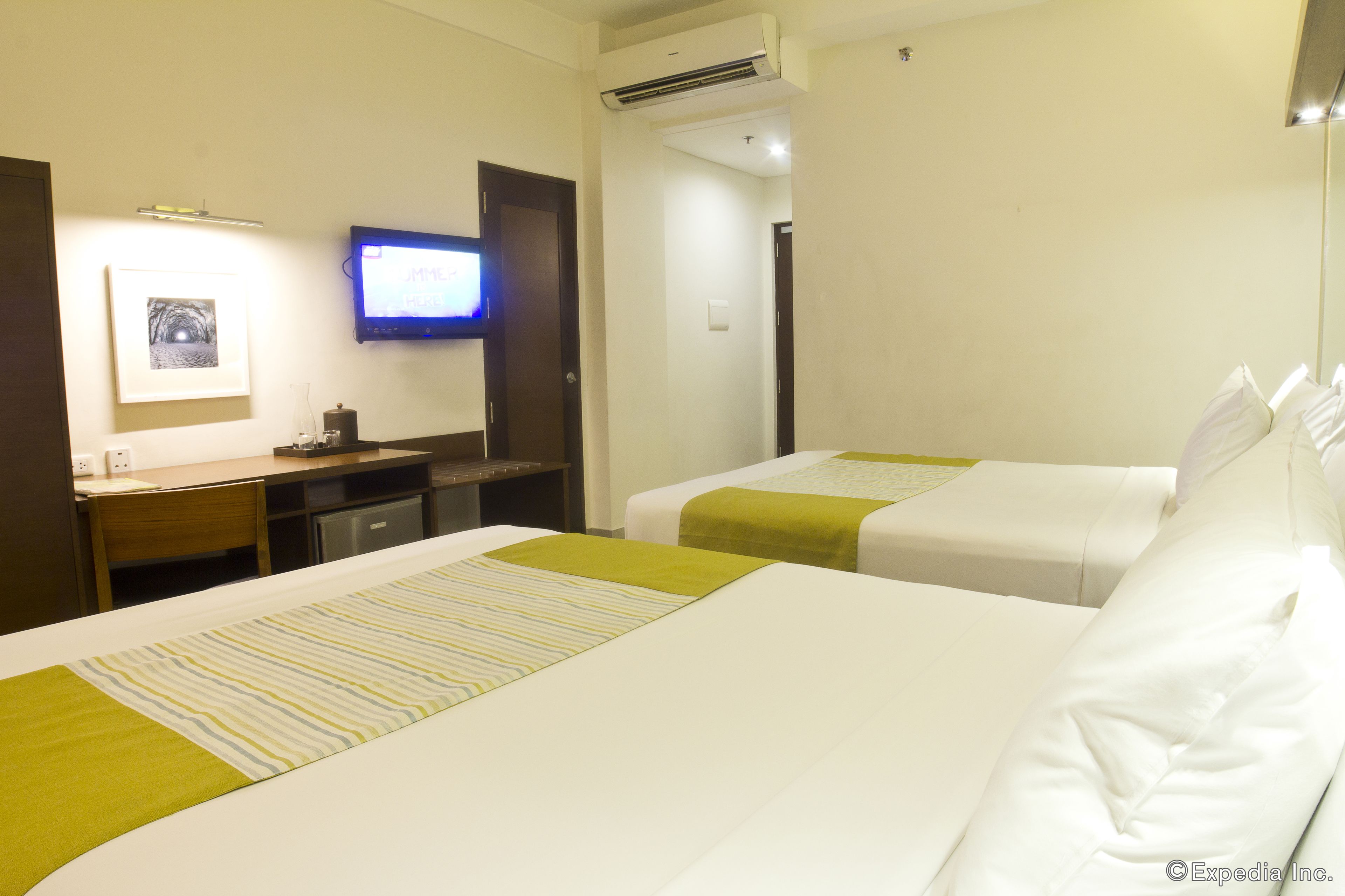 room, 2 queen beds, non smoking | in-room safe, desk, iron/ironing board, free wifi