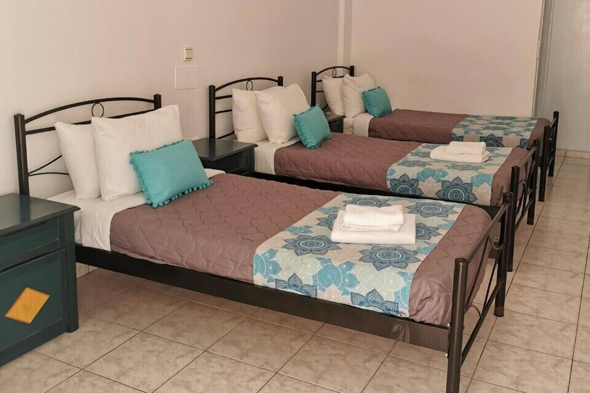 Habitación triple | Wifi gratis y ropa de cama