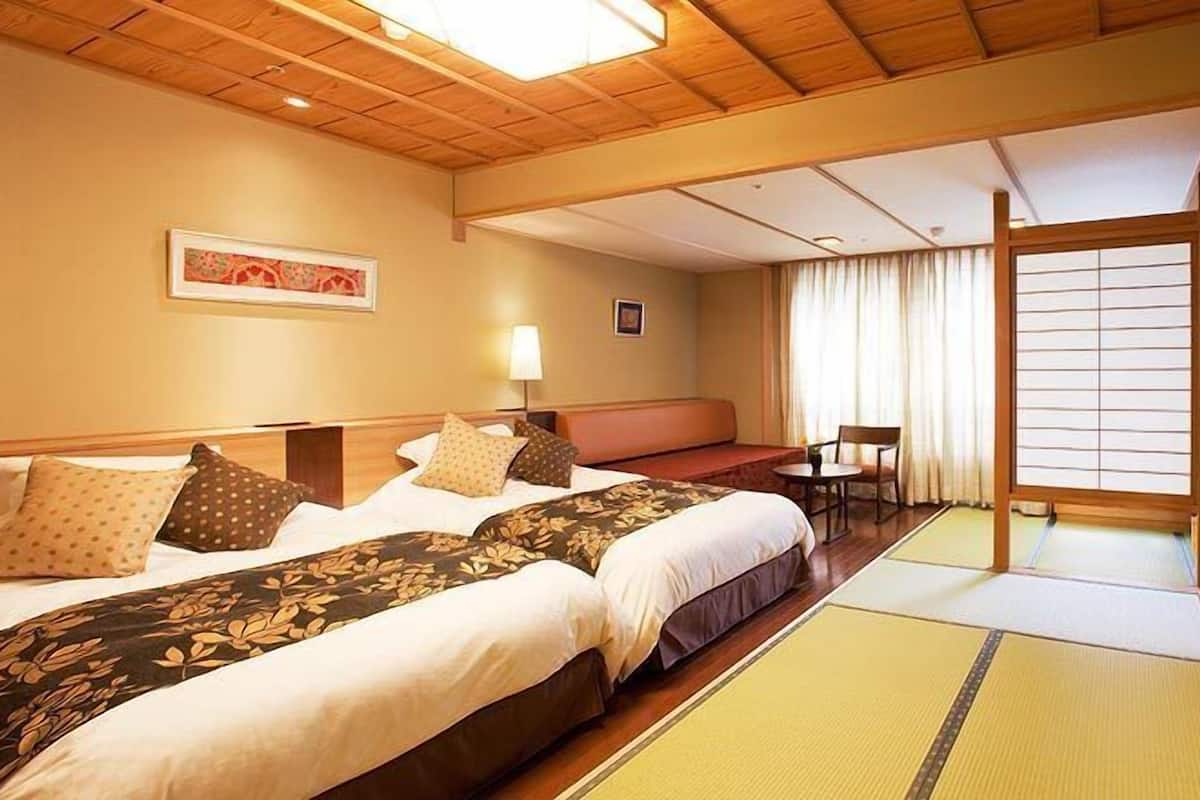 Premium bedding, down duvets, in-room safe, desk