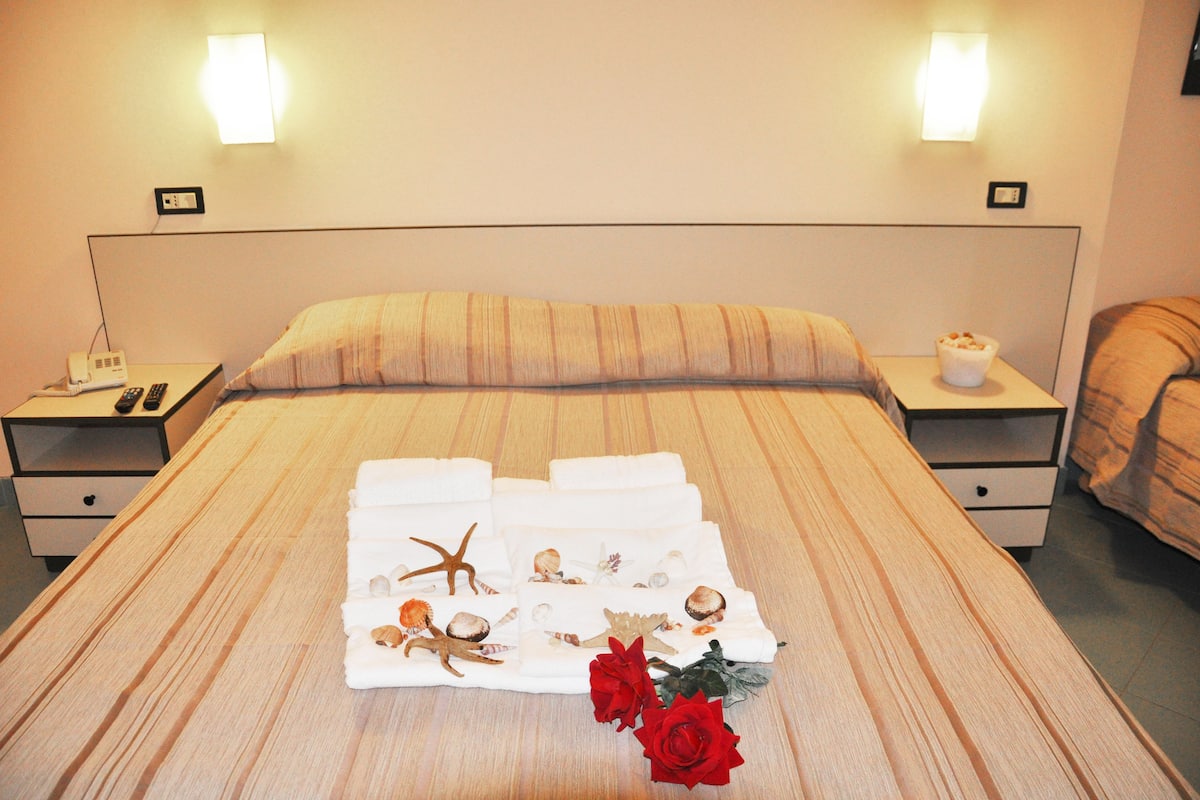 Ropa de cama de alta calidad y minibar