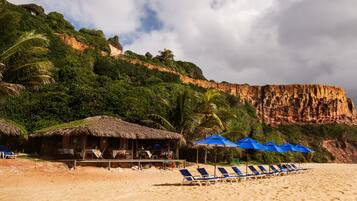 Areia branca, bar na praia