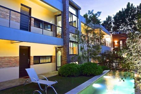 Outdoor pool, open 9:00 AM to 8:00 PM, pool umbrellas, sun loungers