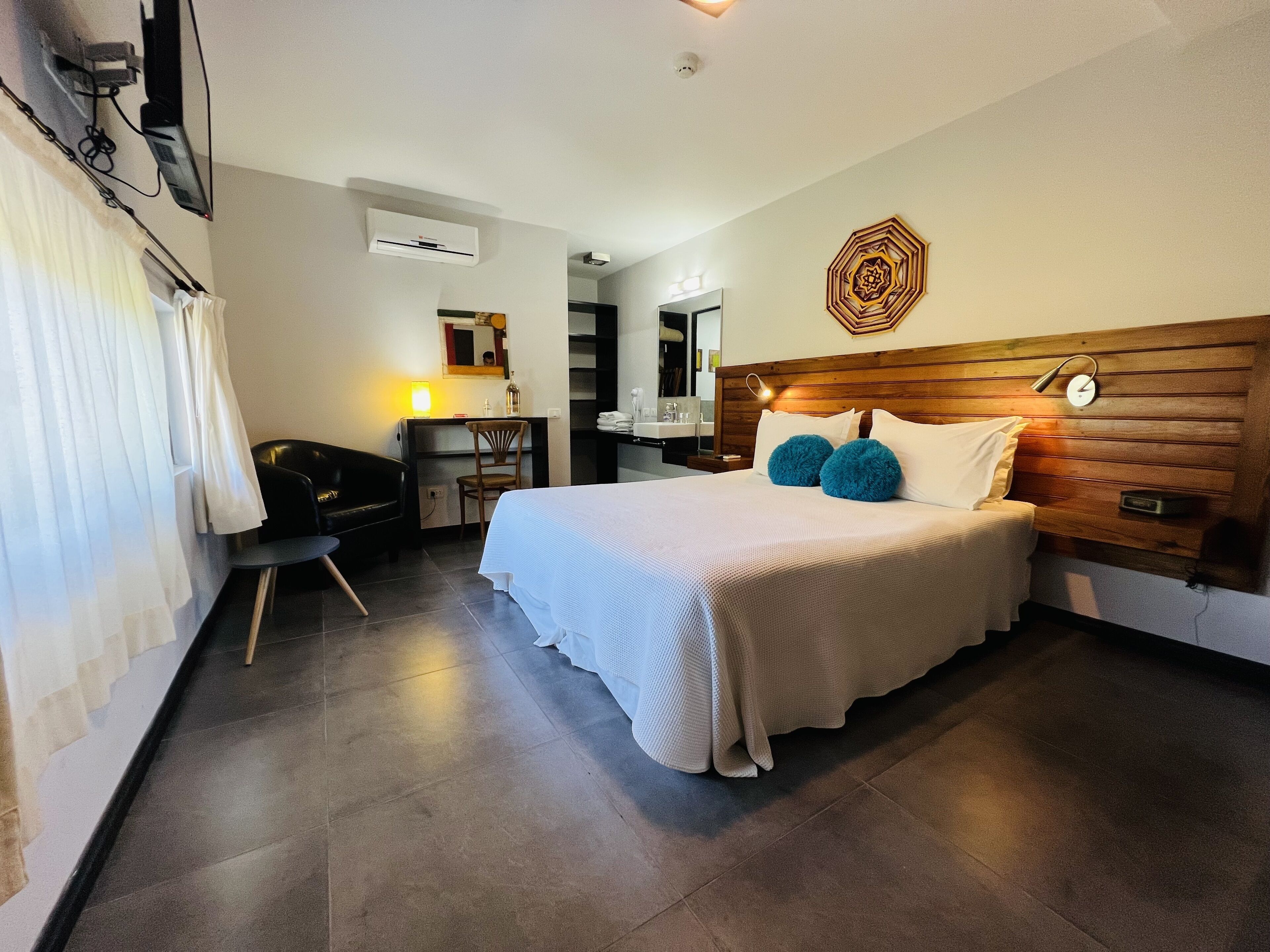 Premium bedding, down duvets, in-room safe, individually decorated