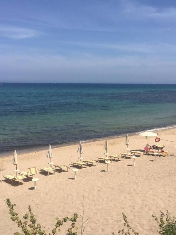 Private beach, white sand, sun loungers, beach umbrellas