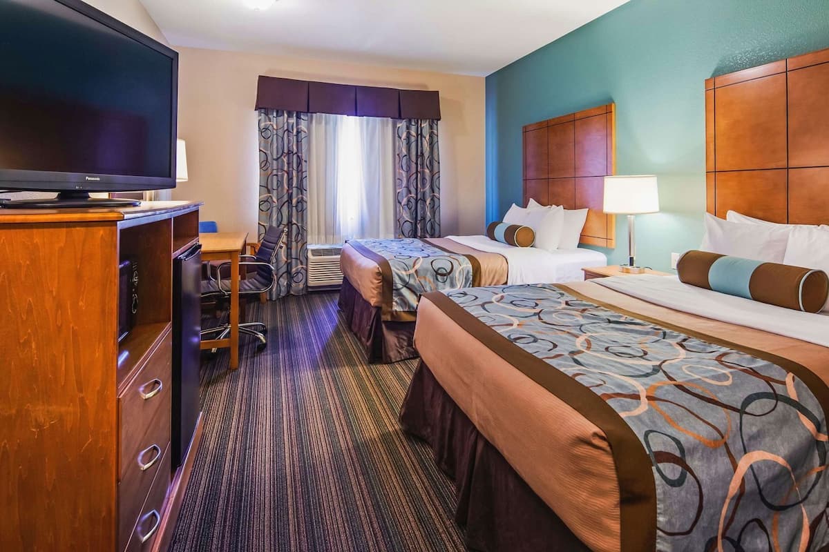 Premium bedding, pillowtop beds, desk, laptop workspace